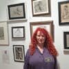 Photo of Lisa Nolan with life drawings